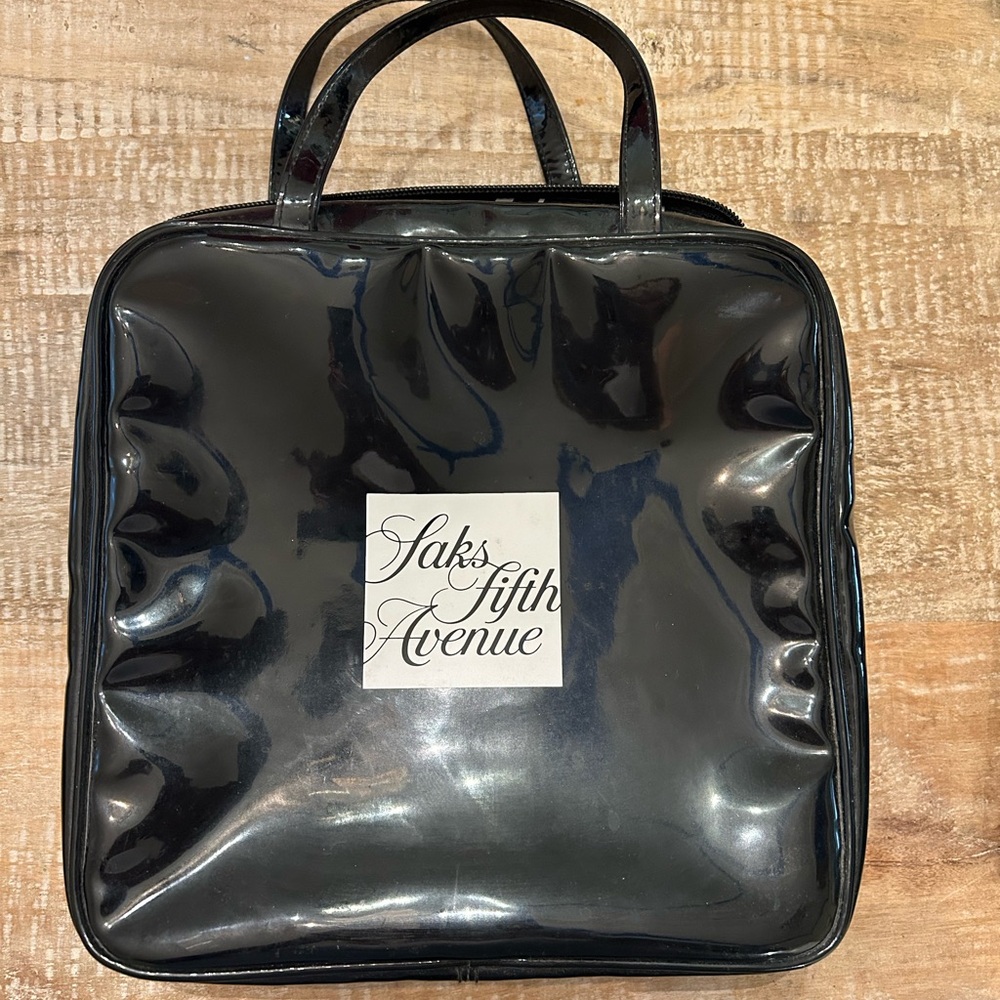 Vintage Saks fifth Avenue accessories bag with handles.